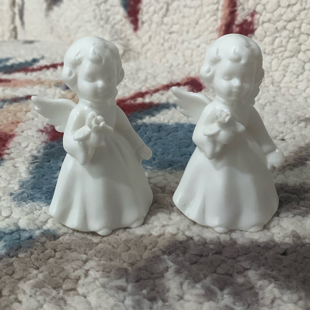 Angel Figurines Holding Flowers